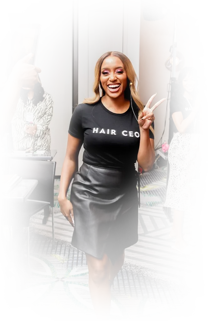 Bianca in black shirt that reads Hair CEO